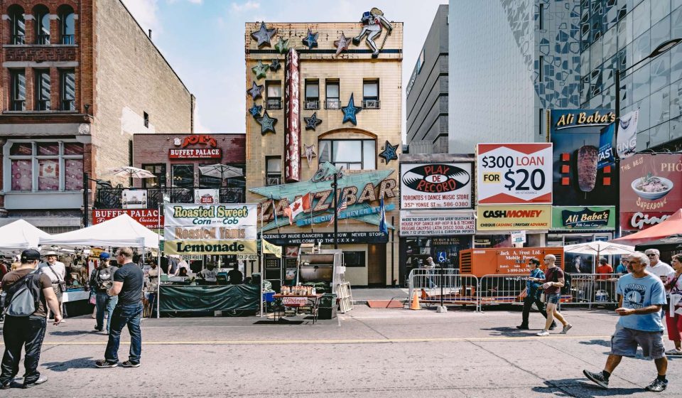 Why do competitors open their stores next to each other